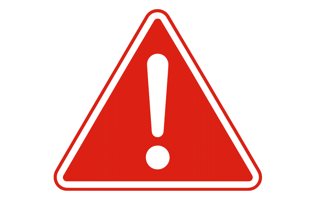 Een foto van een rood gevaarsbord. 